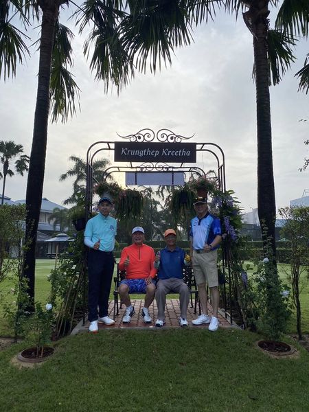 4 people people standing outdoors palm trees and Krungthep Kreetha