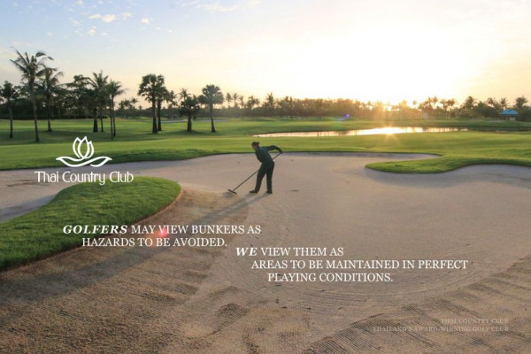 Thai Country Club 1 person grass golf course and Thai Country Club GOLFERS MAY VIEW BUNKERS AS HAZARDS TO BEAVOIDED WE VIEW THEM AS AREAS TO BE MAINTAINED IN PERFECT PLAYING CONDITIONS THILAPS AARDAMENVNG GOLFCLCB