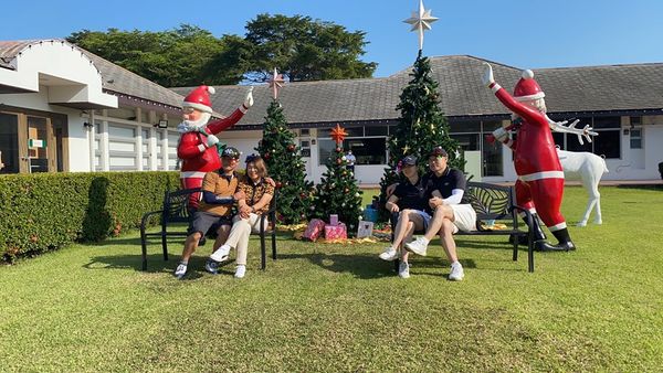 The Pine Golf Club 3 people people standing christmas tree and outdoors