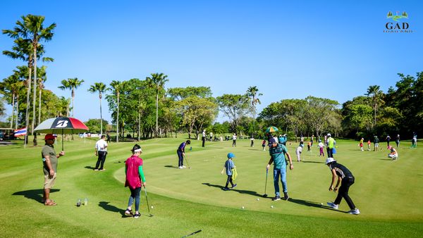 Lotus Valley Golf Resort 6 people people playing sports and grass