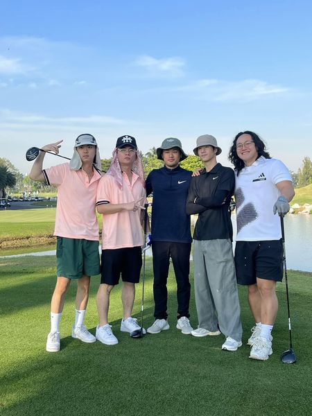 Summit Windmill Golf Club amp Residence 4 people and people standing