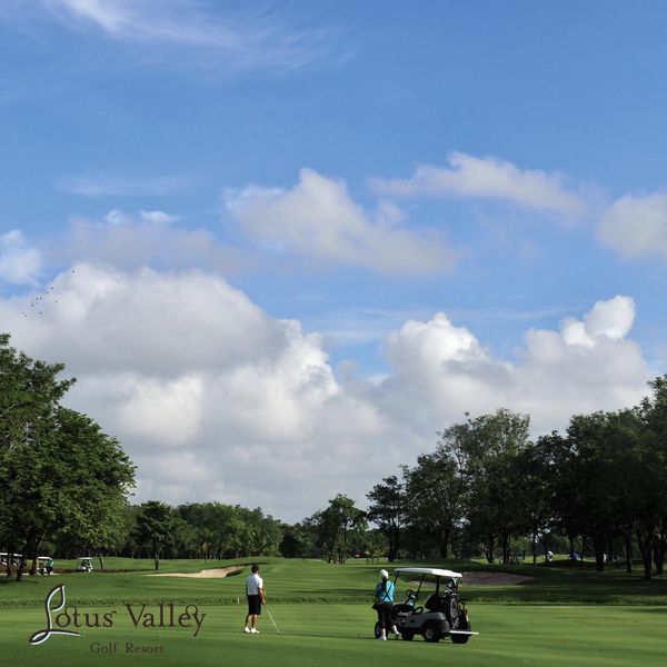 Lotus Valley Golf Resort 4 people golf course and grass