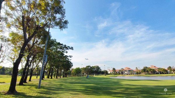Thana City Country Club 1 person tree grass and sky