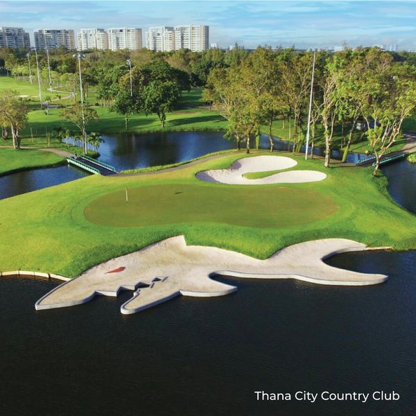 Thana City Country Club 1 person grass golf course nature and 2 Thana City Country Club