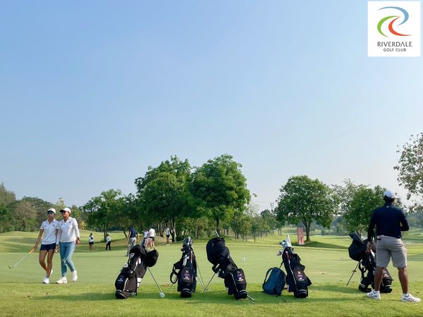 Riverdale Golf Club 7 people outdoors and RIVERDALE GOLF CLUB