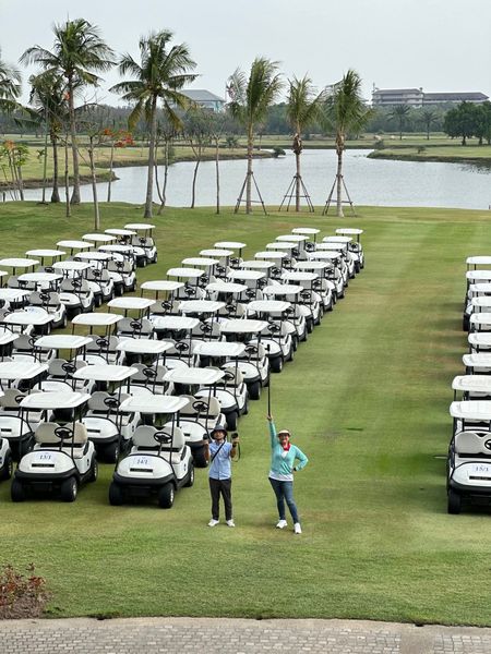 Bangpakong Riverside Country Club 2 people people golfing golf cart and golf course