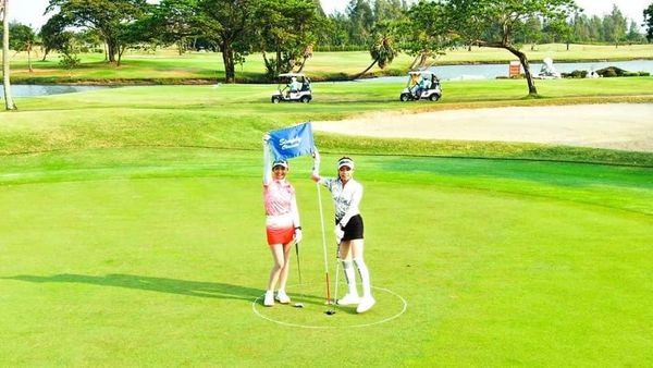 Bangpakong Riverside Country Club 2 people people golfing golf cart and golf course