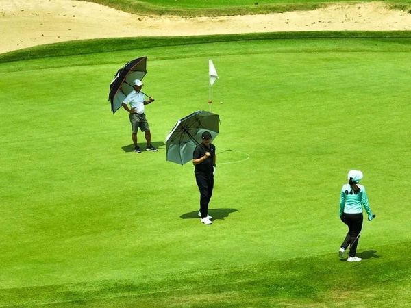 Bangpakong Riverside Country Club 3 people people golfing golf cart golf course and text