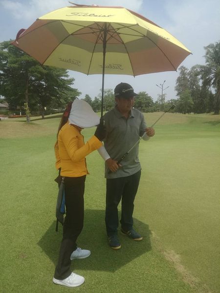 The Pine Golf Club 2 people people golfing and golf course