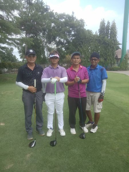 The Pine Golf Club 4 people people golfing and golf course