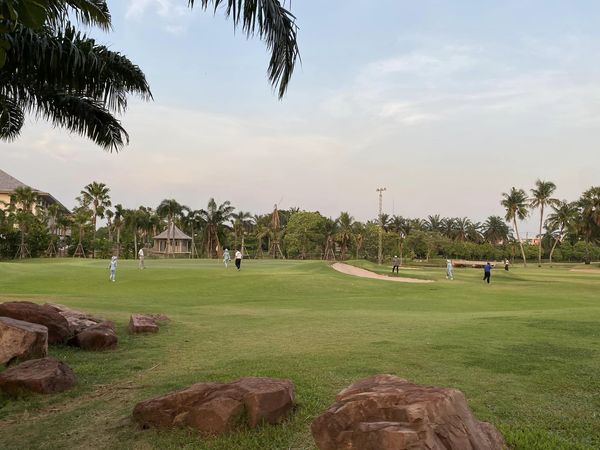 Summit Windmill Golf Club amp Residence 5 people people golfing twilight golf course and grass