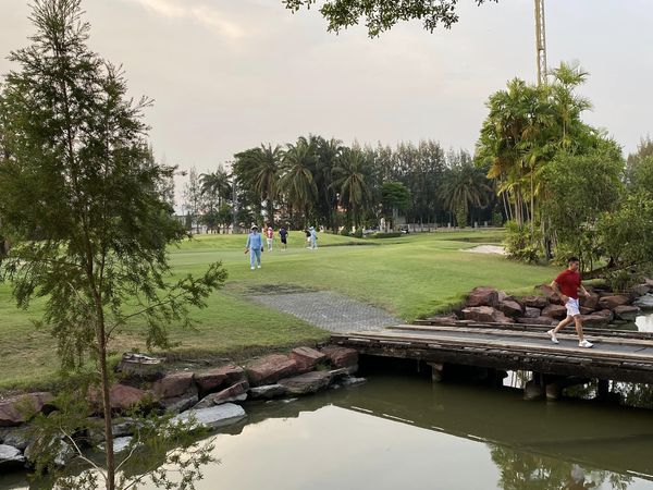 Summit Windmill Golf Club amp Residence 6 people people golfing golf course and grass