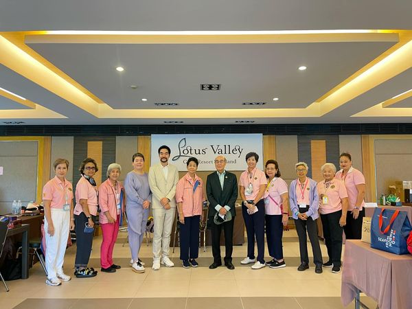 Lotus Valley Golf Resort 12 people suit and text