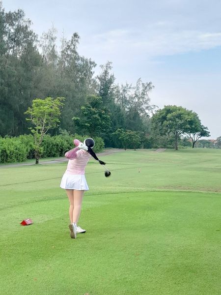 Bangpakong Riverside Country Club 1 person golfing and golf course