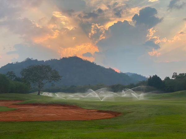 Bangpakong Riverside Country Club grass golf course and twilight