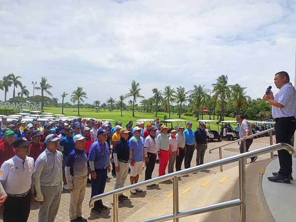 Bangpakong Riverside Country Club 6 people people golfing golf cart golf course and crowd
