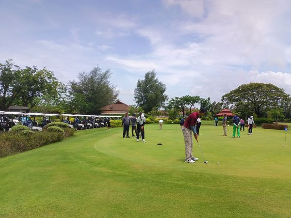 Bangpakong Riverside Country Club 9 people people golfing and golf course