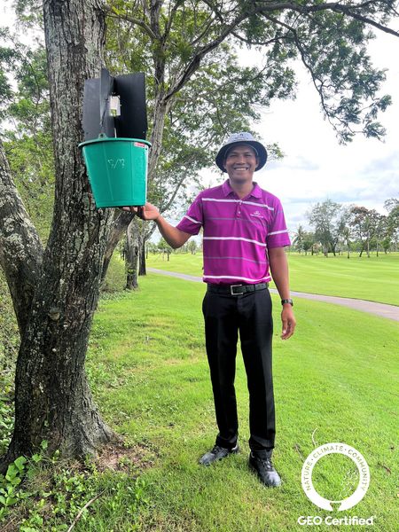 Thai Country Club 1 person golfing golf cart tree golf course and 90 CLIMATE C GEO Certified