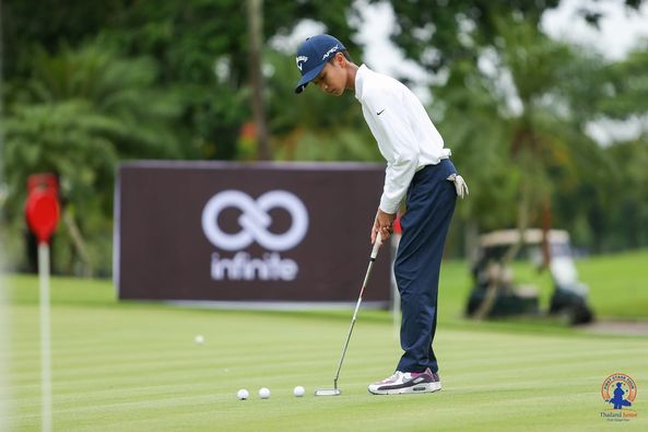 Lotus Valley Golf Resort 1 person golfing golf course and text-3