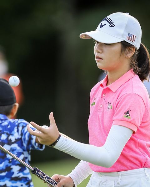 Lotus Valley Golf Resort 2 people people golfing golf course and text