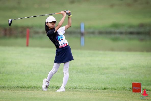 Lotus Valley Golf Resort 1 person golfing golf course and text-4