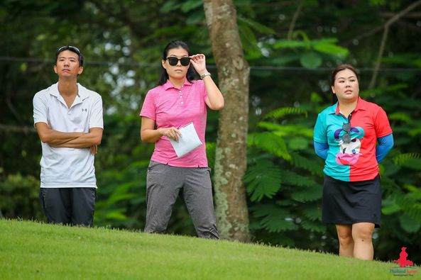 Lotus Valley Golf Resort 3 people people golfing golf course and text