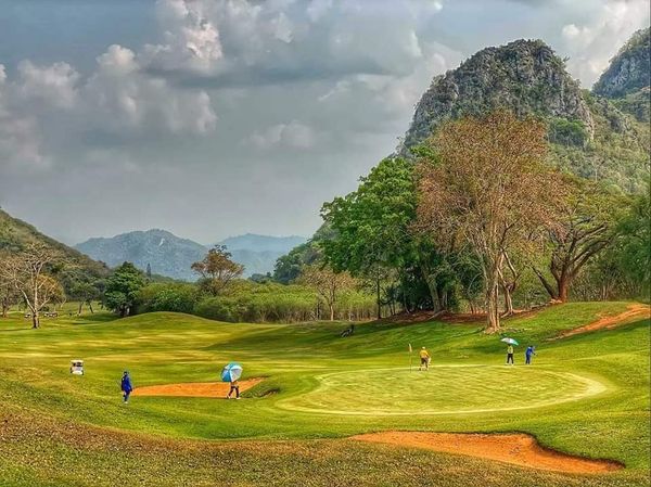 Bangpakong Riverside Country Club 4 people people golfing and golf course