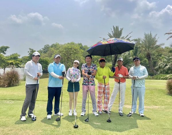 Bangpakong Riverside Country Club 7 people people golfing and golf course