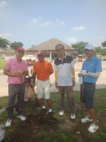 The Pine Golf Club 4 people people golfing and golf course
