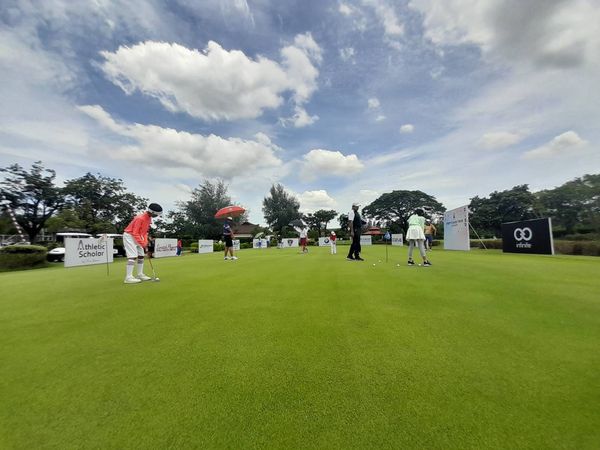 Bangpakong Riverside Country Club 6 people people golfing golf cart and golf course