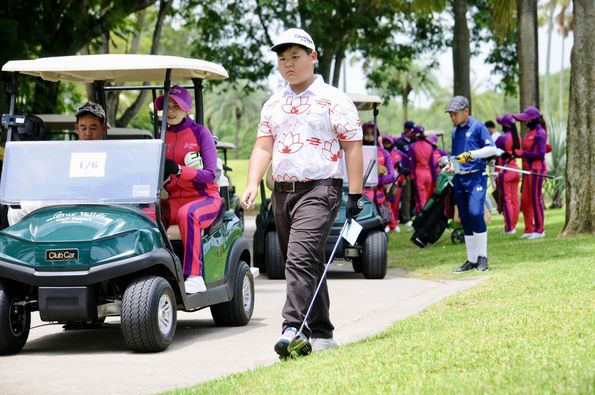 Lotus Valley Golf Resort 8 people people golfing golf cart golf course and text