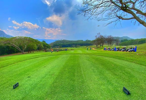 Bangpakong Riverside Country Club 3 people people golfing golf course and grass