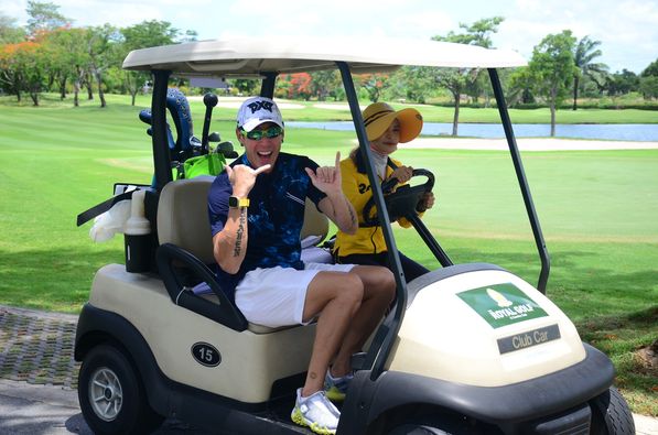 The Royal Golf amp Country Club 2 people people golfing golf cart golf course and text