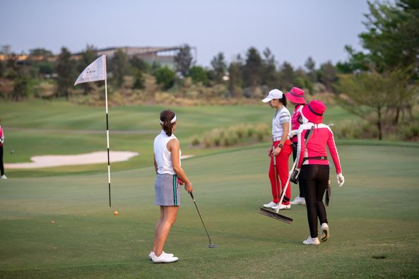 Nikanti Golf Club Nakhon Pathom 4 people people golfing golf course and text