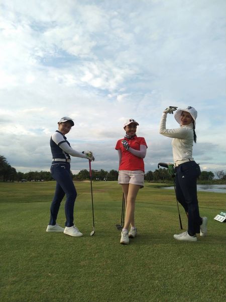 Bangpakong Riverside Country Club 3 people people golfing and golf course