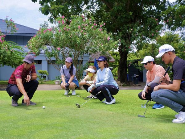 Muang Ake Golf Club 6 people people golfing and golf course
