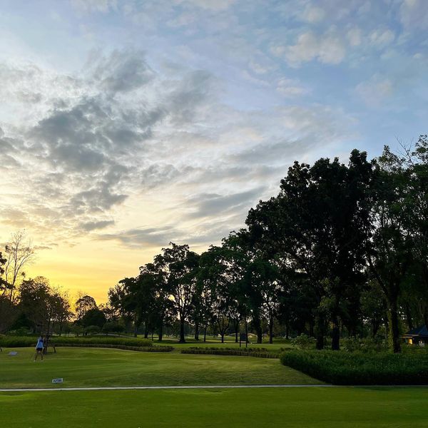 Flora Ville Golf amp Country Club 1 person golfing golf course and twilight
