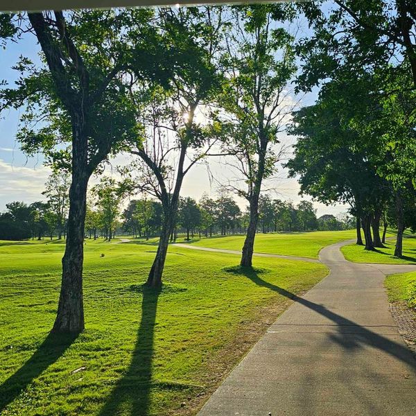 Flora Ville Golf amp Country Club golf golf cart nature golf course grass and text