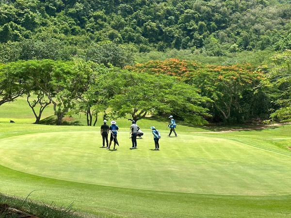 Bangpakong Riverside Country Club 5 people people golfing golf cart and golf course