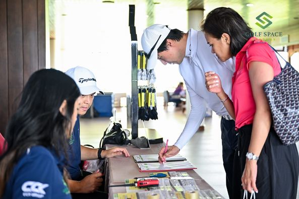 Bangpakong Riverside Country Club 2 people people golfing and text