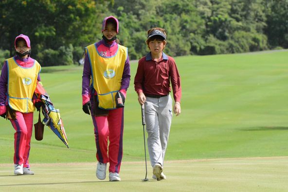 Lotus Valley Golf Resort 3 people people golfing golf course and text
