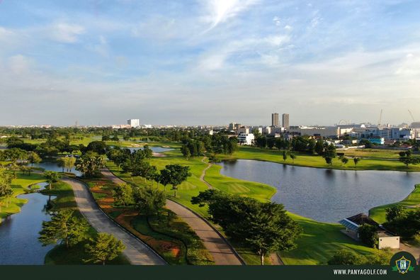 Panya Indra Golf Club grass golf course lake and twilight