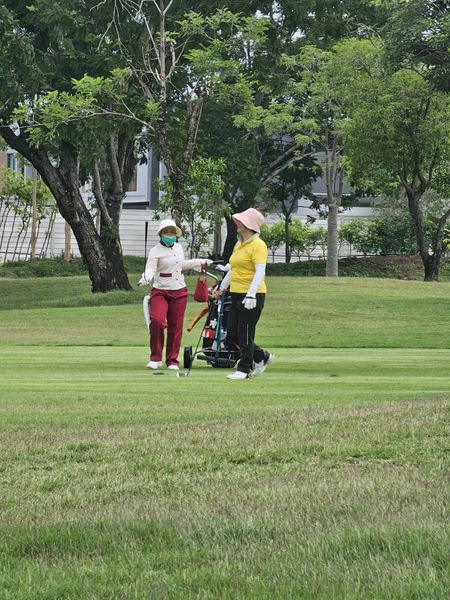 Muang Kaew Golf Course 2 people people golfing segway golf cart scooter wheelchair lawnmower and golf course