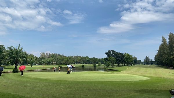 The Pine Golf Club 7 people people golfing golf cart and golf course