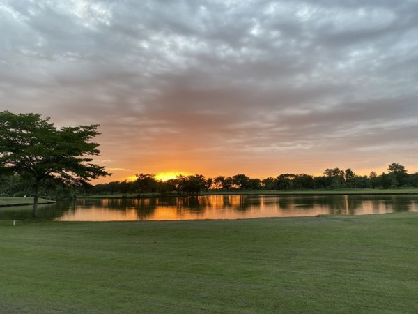 The Pine Golf Club lake nature golf course grass horizon and twilight