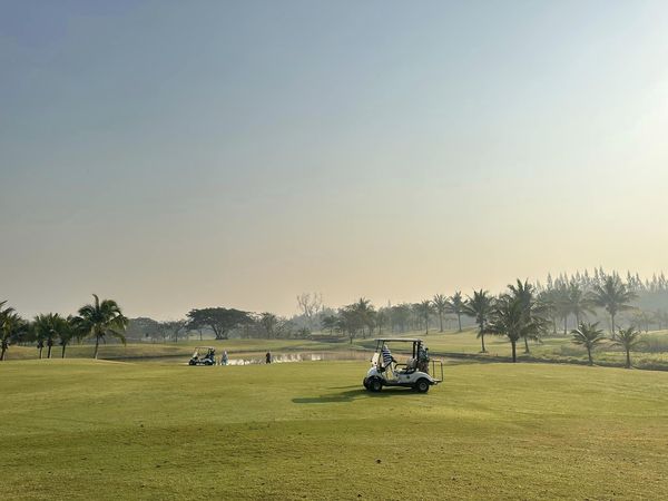 สนามกอล์ฟหริภุญชัย กอล์ฟคลับ 1 person golfing golf cart golf course and grass