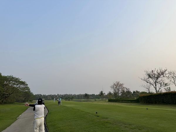 สนามกอล์ฟหริภุญชัย กอล์ฟคลับ 2 people people golfing golf course fog and grass
