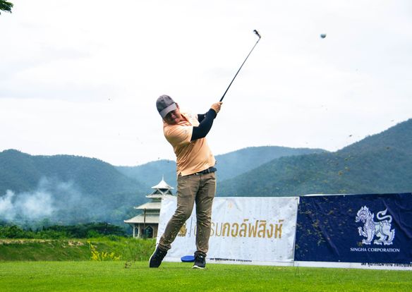 Gassan Khuntan Golf amp Resort Thailand 1 person golfing golf course and text-3