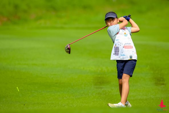 Alpinegolfresort Chiangmai 1 person golfing golf course and text-2