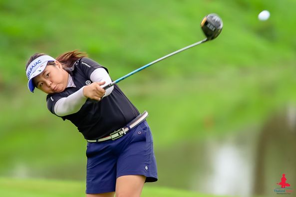 Alpinegolfresort Chiangmai 1 person golfing golf course and text-3
